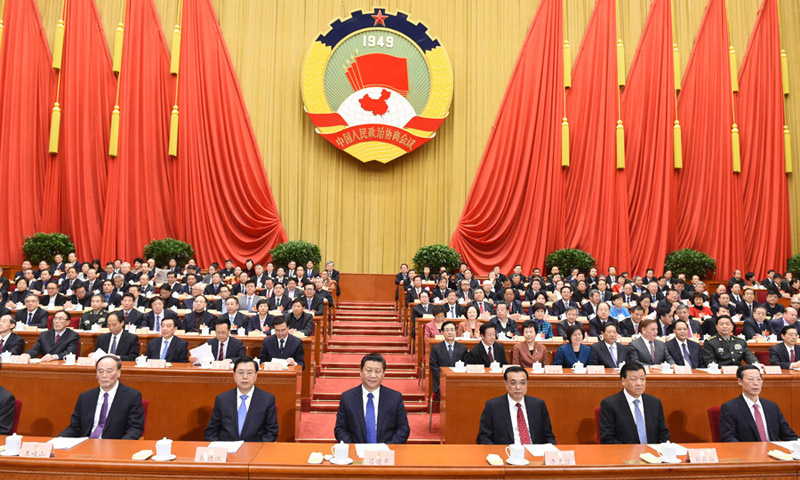 3月13日，中國人民政治協商會議第十二屆全國委員會第三次會議在北京閉幕。這是習近平、李克強、張德江、劉雲山、王岐山、張高麗等在主席臺就座。     新華社記者李學仁攝