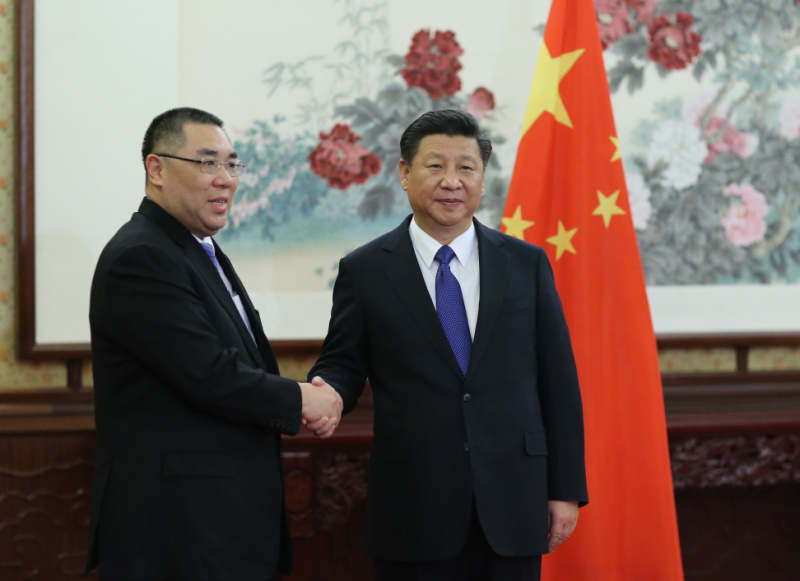 12月23日，國家主席習近平在中南海會見了來京述職的澳門特別行政區(qū)行政長官崔世安。新華社記者 蘭紅光 攝