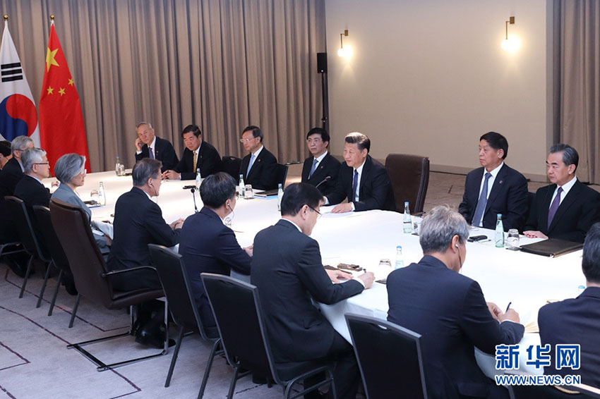 7月6日，國家主席習近平在柏林會見韓國總統文在寅。 新華社記者 王曄攝