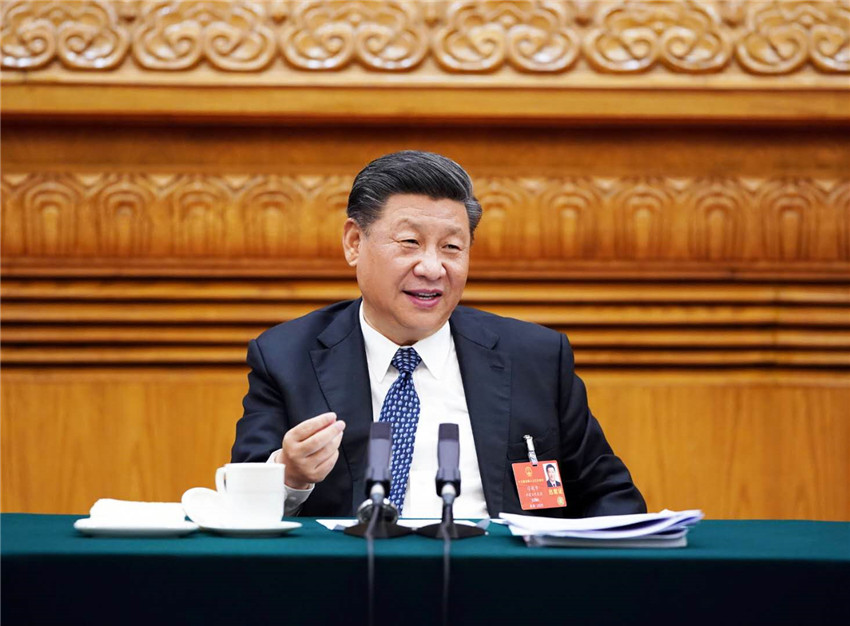 5月24日，中共中央總書記、國家主席、中央軍委主席習(xí)近平參加十三屆全國人大三次會議湖北代表團的審議。 新華社記者 李學(xué)仁 攝