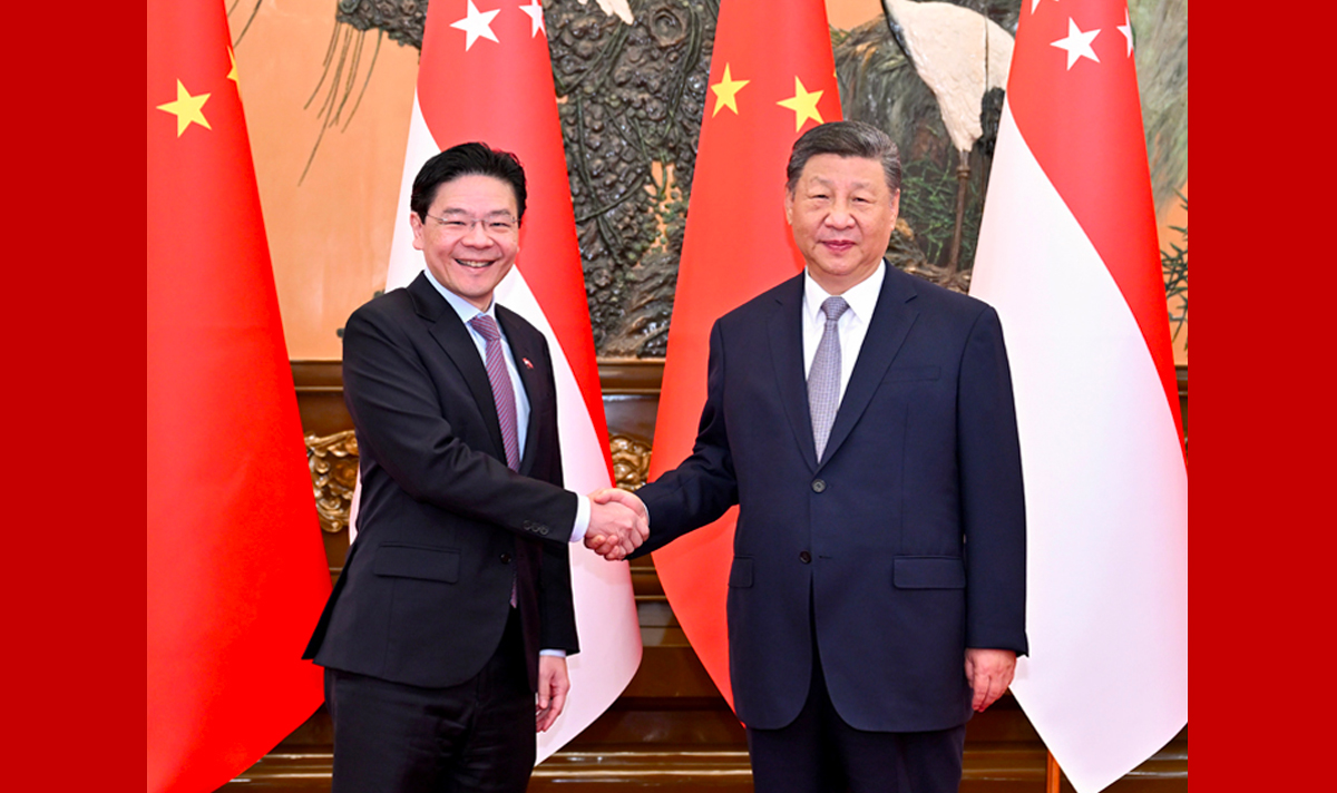 習(xí)近平會(huì)見(jiàn)新加坡總理黃循財(cái)